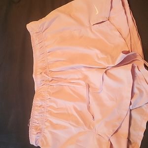 Light pink Nike shorts